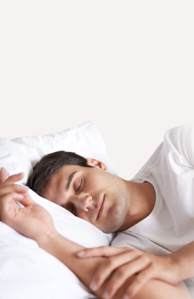 man with a clear passage large nasal strip laying down and sleeping without snoring